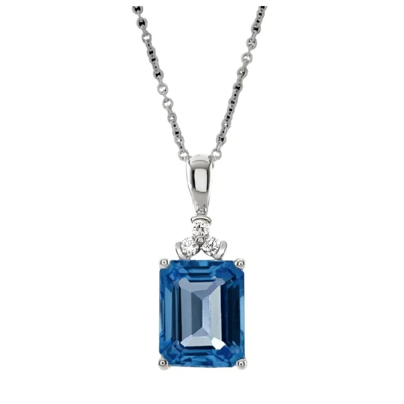 Carved initial engagement rings-18ct White Gold Rectangular Cut Blue Topaz & Diamond Pendant & Chain