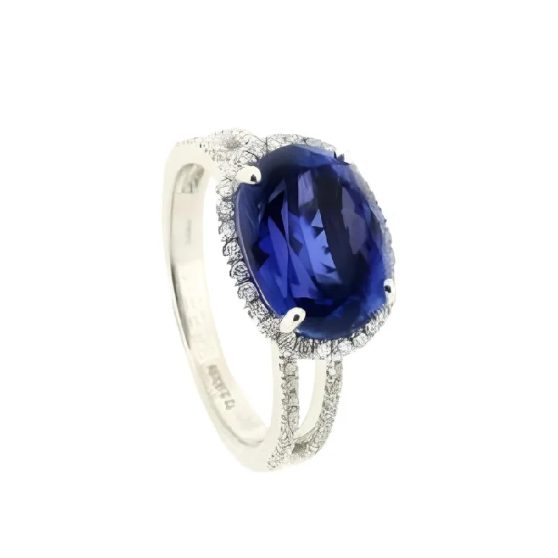 Retro flair engagement rings-18ct White Gold Oval Cut Tanzanite & Diamond Halo Cluster Ring with Split Diamond Shoulders