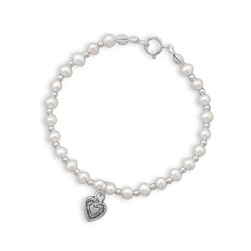 Tribal medallion bangles-6" Cultured Freshwater Pearl and Silver Bead Bracelet with Oxidized Heart