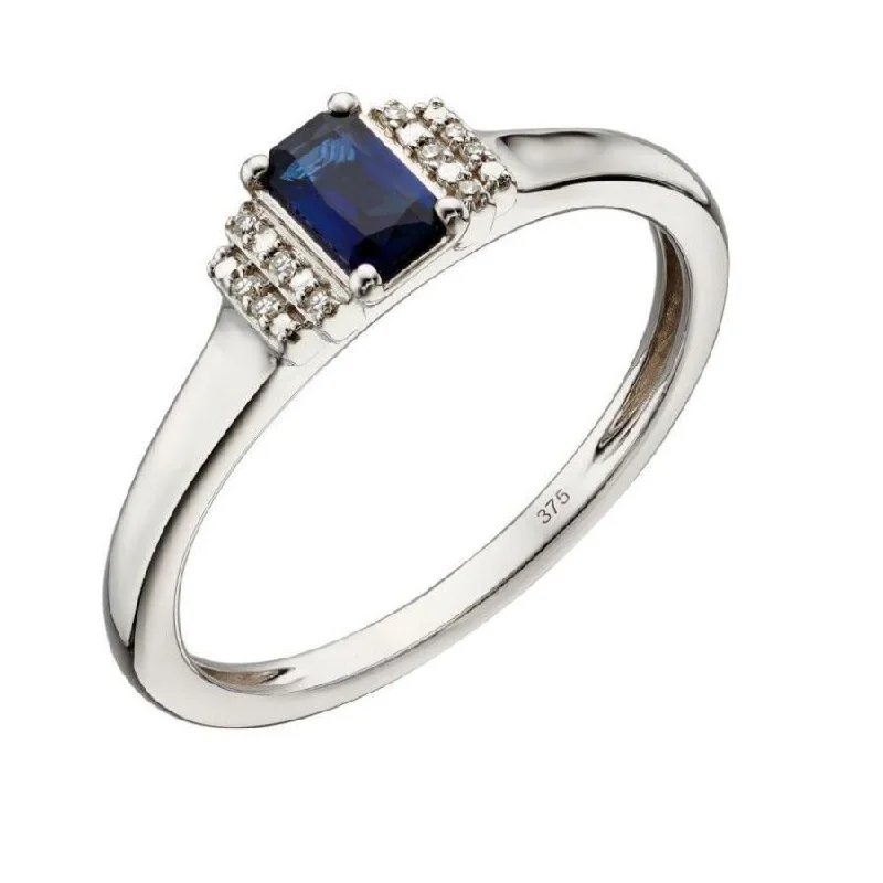 Citrine cut engagement rings-9ct White Gold Emerald Cut Sapphire & Stepped Diamond Shoulders Ring